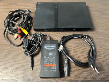 PS2 Slim con alimentatore e cavi