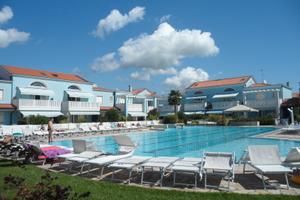 Appartamento in villaggio con piscina