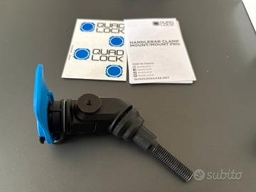 Quad lock handlebar clamp