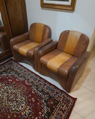 coppia poltrone vintage in pelle bicolore 