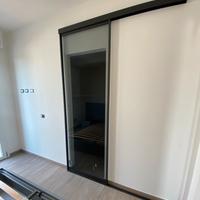 Porta scorrevole come nuova in vetro fumè