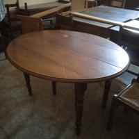 Tavolo tondo in legno noce moderno 