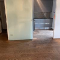 Porta scorrevole in cristallo con binario