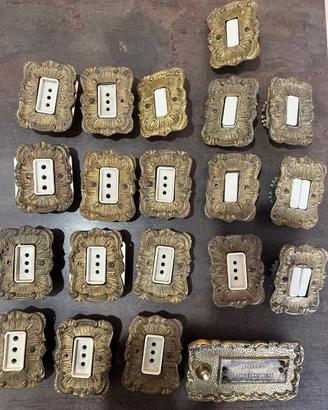 Placche ottone e interruttori in ceramica d'epoca