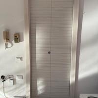 Porta interna a libro doppia anta