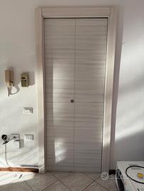 Porta interna a libro doppia anta