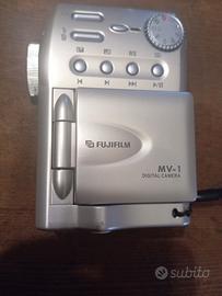 cinepresa fujica mv1 e altro materiale fotografico