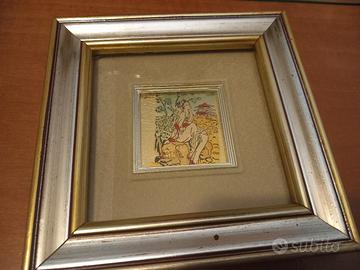 disegno su foglia in oro 