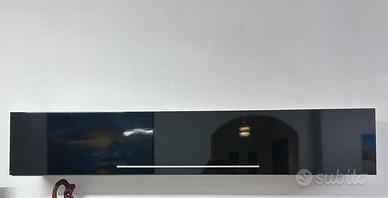 Mobile sospeso, living porta TV