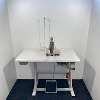 Macchina attaccabottoni Juki