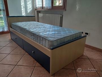 Letto singolo con cassettoni e materallo
