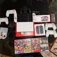 Nintendo Switch Oled + giochi + accessori