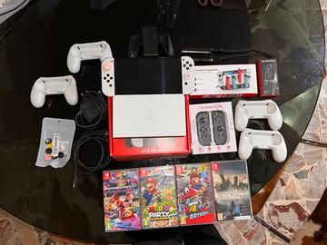 Nintendo Switch Oled + giochi + accessori