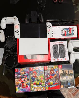 Nintendo Switch Oled + giochi + accessori