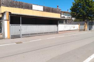 Doppio box con terreno adiacente