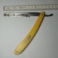 Antico rasoio mano libera