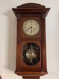 Orologio muro in legno con pendolo