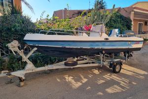 barca con motore e carrello per  alaggio 