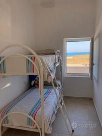 Casa fronte mare