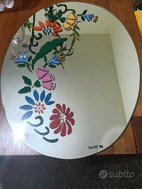 specchio tagliato a mano e dipinto  