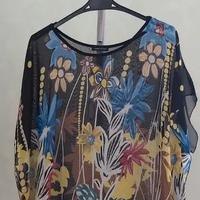 Blusa trasparente a fantasia fiori
