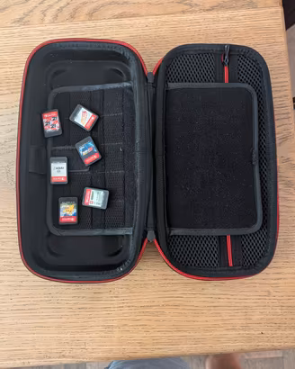 Custodia + Giochi + Console Switch 