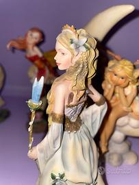 Collezione di statue di fatine