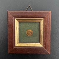 Quadro (Moneta piu piccola del mondo)
