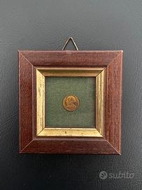 Quadro (Moneta piu piccola del mondo)