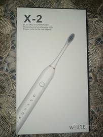 spazzolino Elettrico + testine Nuovo imballato 