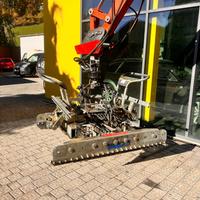 Macchina per la posa di pietre per pavimentazione