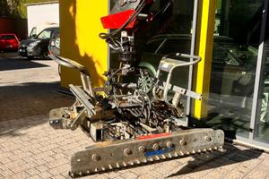 Macchina per la posa di pietre per pavimentazione