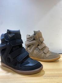 Scarpe con zeppa interna