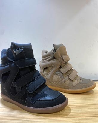 Scarpe con zeppa interna