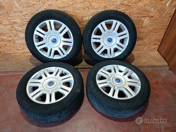 4 RUOTE CERCHI IN LEGA 15" COMPLETE FIAT IDEA