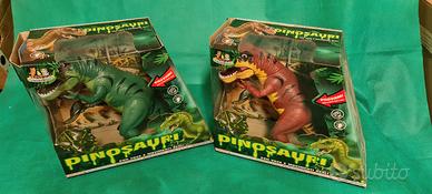 2 dinosauri ancora in scatola con suoni e si muovo