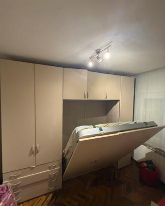 Camera armadio con letto a scomparsa