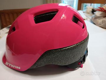 Casco Btwin rosa x bimba