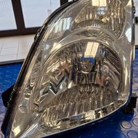 Faro ANTERIORE SINISTRO cromato Suzuki Swift 05>10