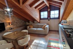 Mansarda bilocale travi a vista