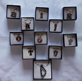 Ciondoli con iniziale in acciaio e oro