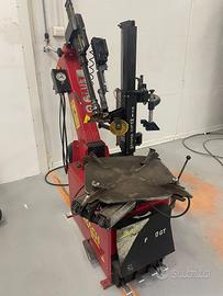 Smontagomme cormach con bracio automotizati