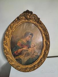 Quadro con cornice in legno dorata 