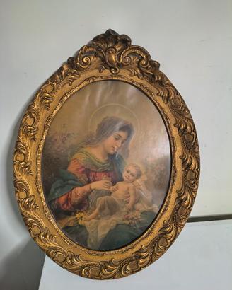 Quadro con cornice in legno dorata 