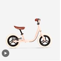 Bici senza pedali BTWIN 500 rosa-marrone.