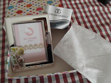 cornice argento Beltrami