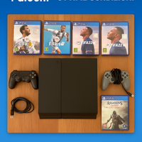 PS4 con 2 controller + 4 giochi (1 nuovo)