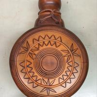 bottiglia rivestita in legno