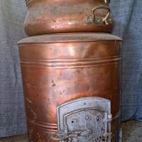 Antiche lavatrici a legna in rame puro