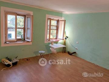 Terra tetto unifamiliare con giardino e box